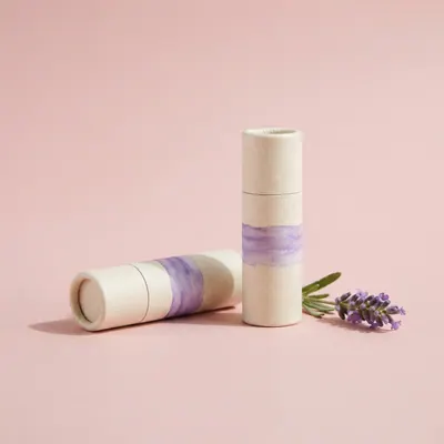 Lavender Lip Balm on a blush pink background