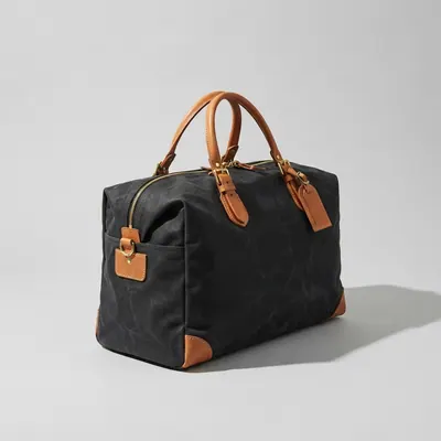 Fold Weekender 40L in black waxed canvas