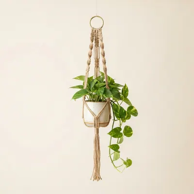 Jute hanging planter with a stoneware cup
