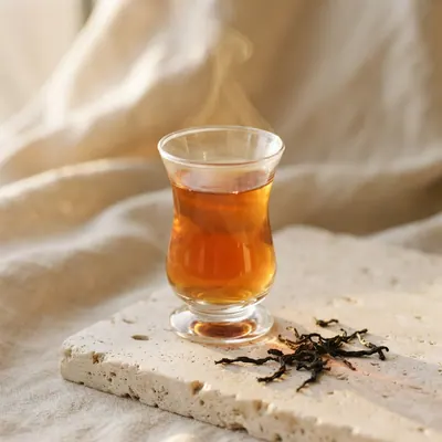 Darjeeling steeped in a glass cup