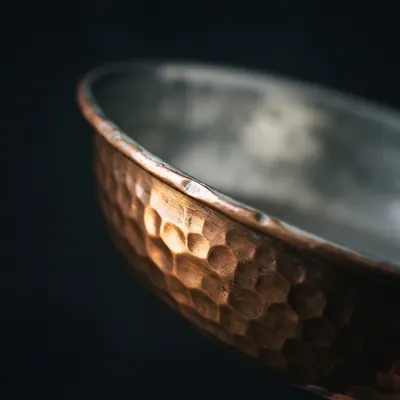 Detail of the hammered copper surface and tin lining