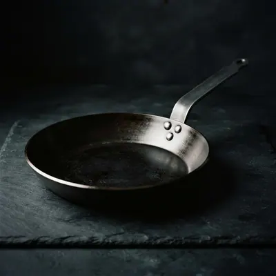 Carbon steel skillet, studio photograph